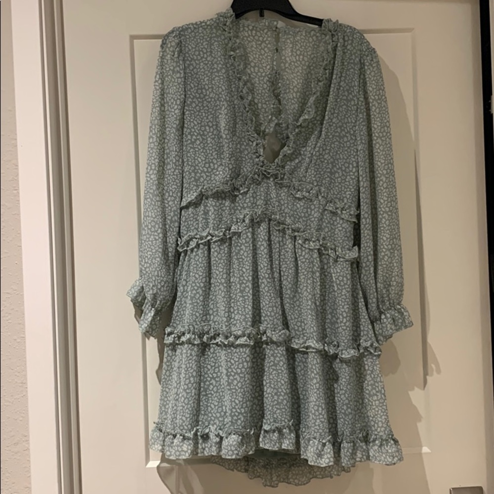Long sleeve, open back, deep V mini dress